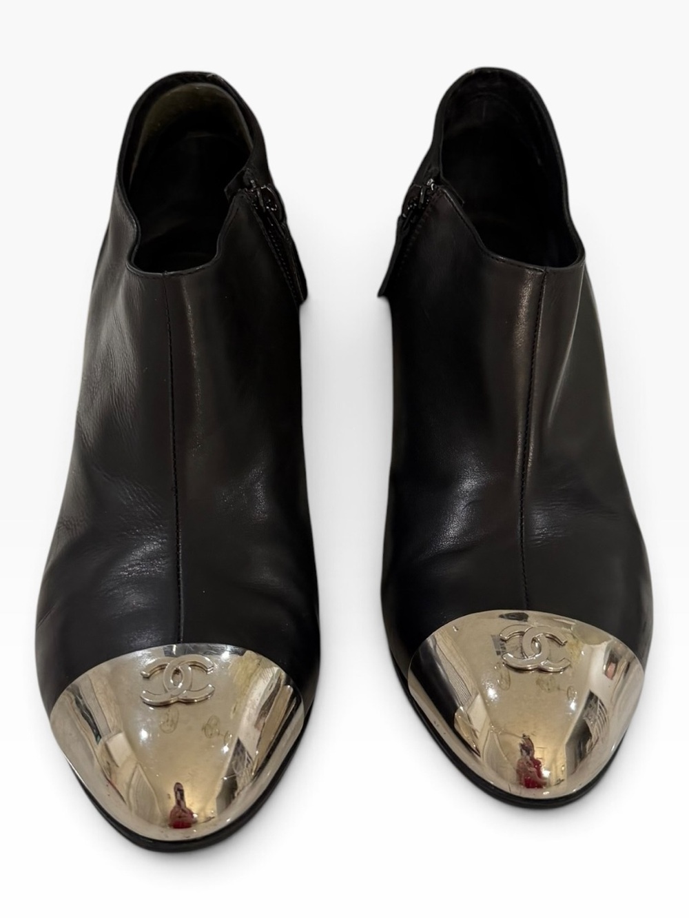 CHANEL Black Leather Ankle Boots with Silver Cap Toe Logo - Picture 4 of 13